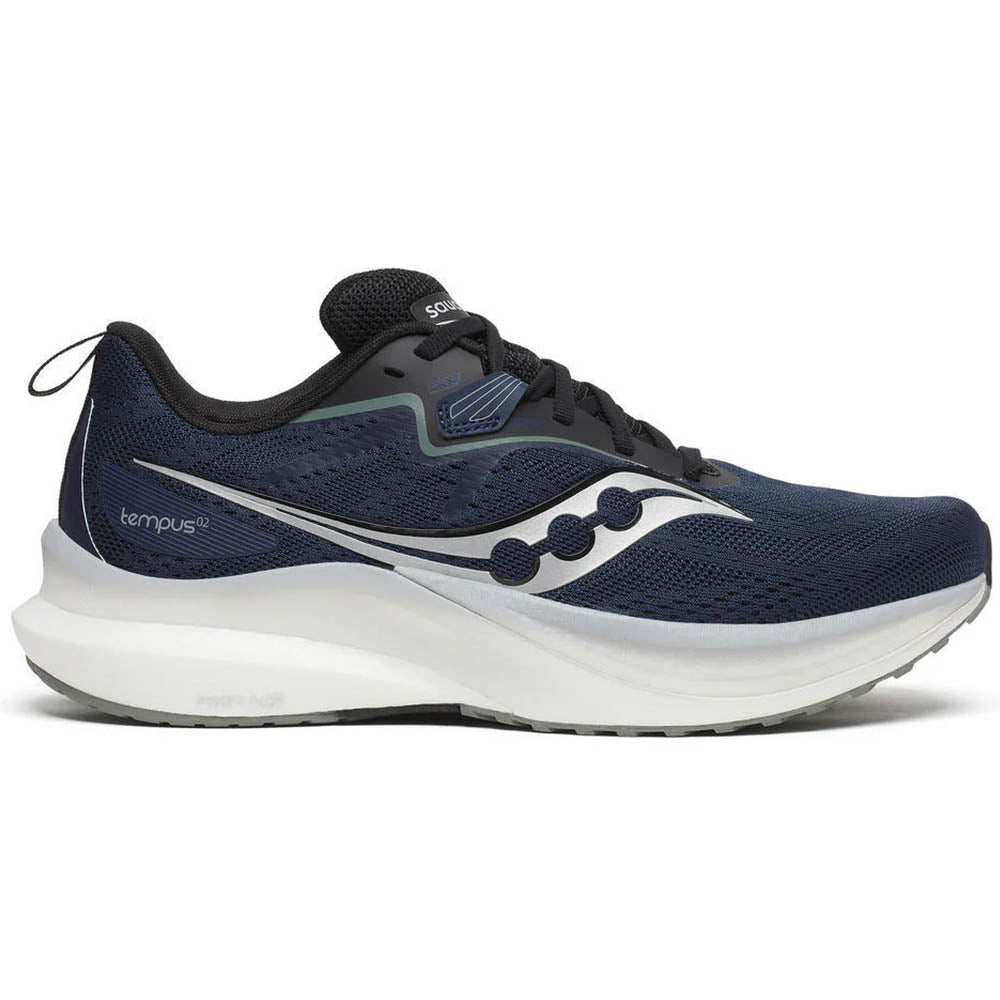 Side view on white background of Mens Saucony Tempus running shoe in Navy/Black, Medium (Regular) width