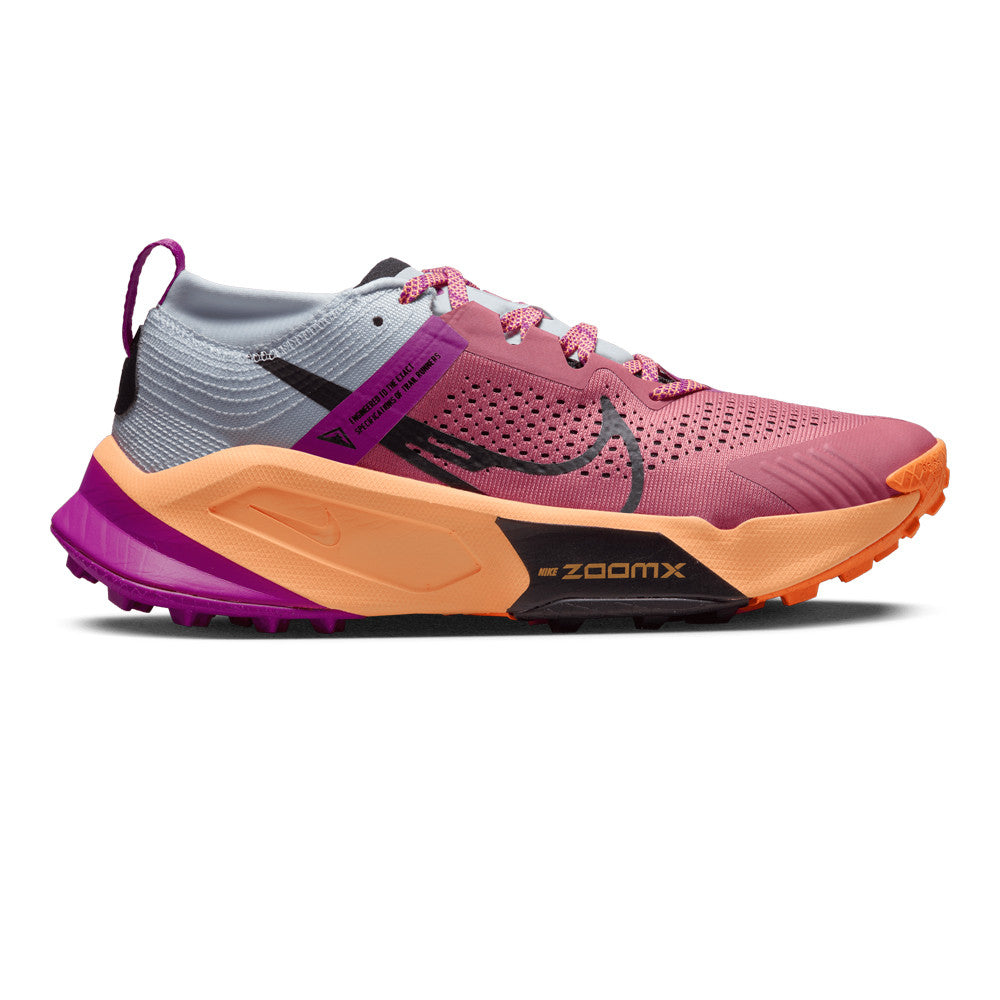 Side view of Nike ZoomX Zegama Trail running shoes in Desert Berry/Black