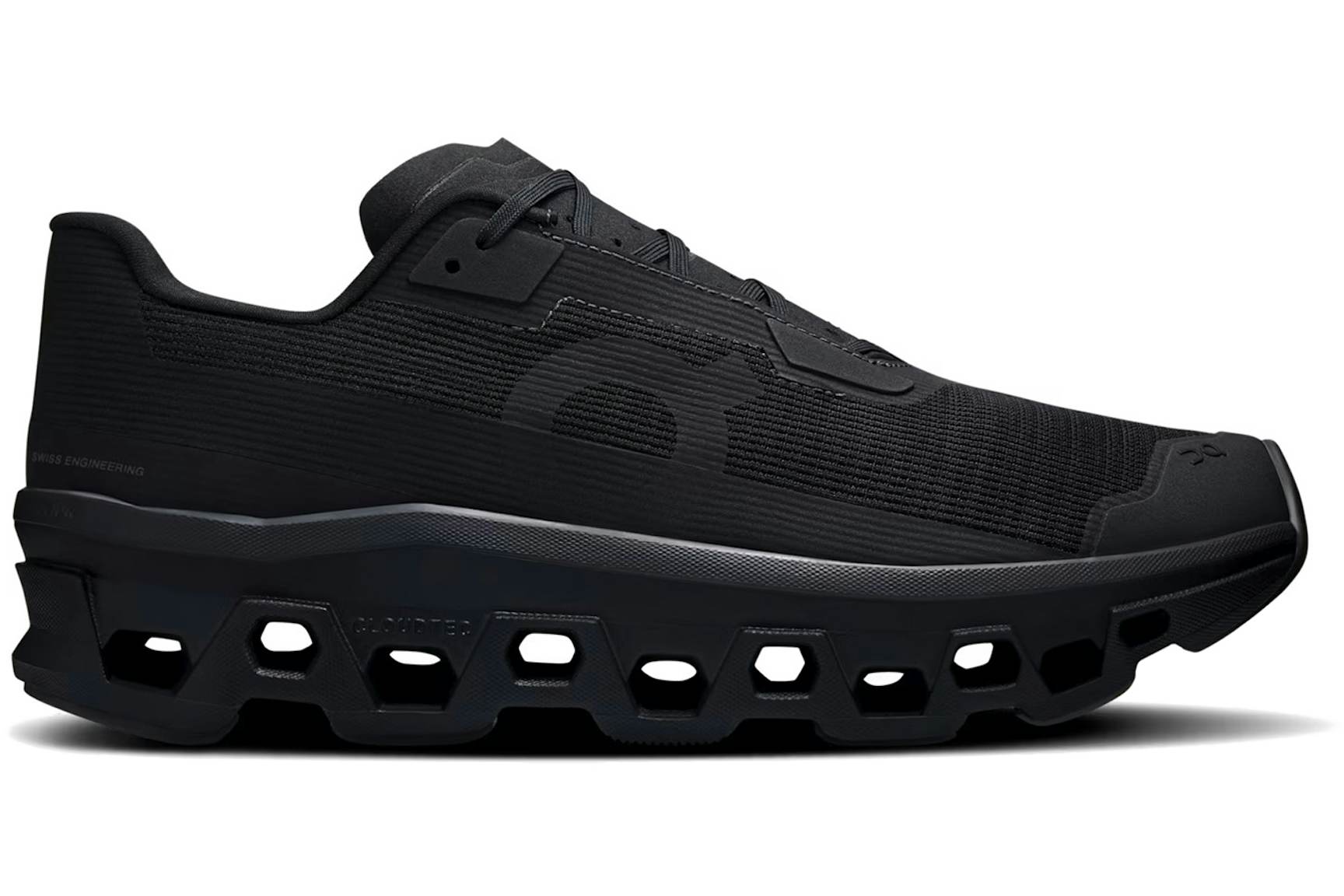 Side view on white background of Womens On Cloudmonster Void running shoe in Black/Black, Medium (Regular) width
