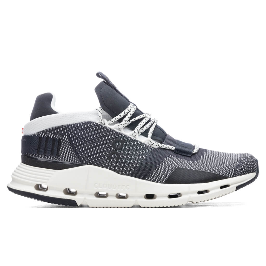 Side view on white background of Womens On Cloudnova running shoe in Black/White, Medium (Regular) width