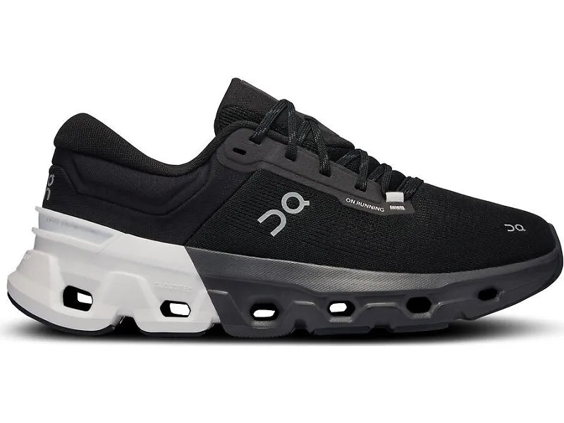 Side view on white background of Womens On Cloudflyer 5 running shoe in Black/White, Medium (Regular) width