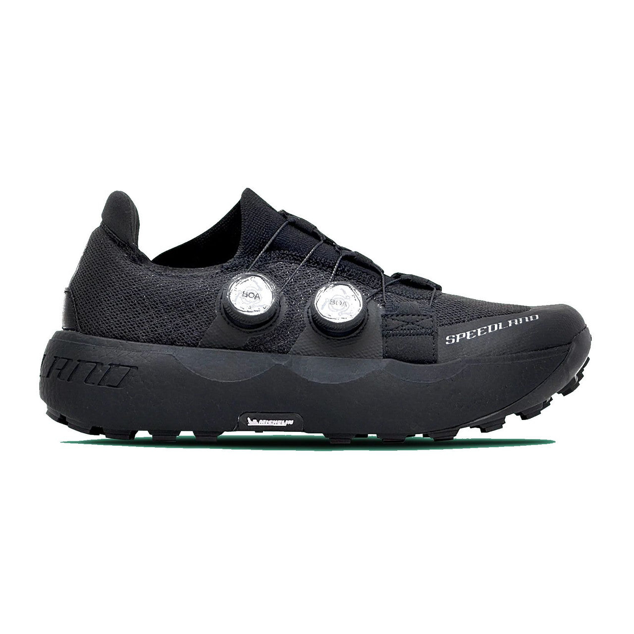 Side view on white background of Unisex Speedland GS:BLK running shoe in Black/Black, Medium (Regular) width