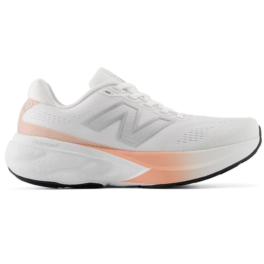 Side view on white background of Womens New Balance Fresh Foam 880 running shoe in Pink Lemonade/White, Medium (Regular) width