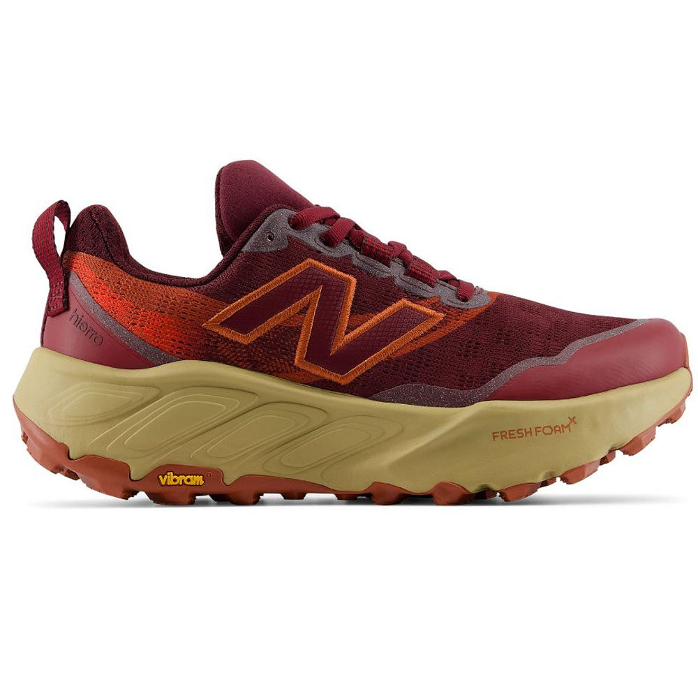 Side view on white background of Womens New Balance Fresh Foam X Hierro running shoe in Mulled Wine/Neo Flame, Medium (Regular) width