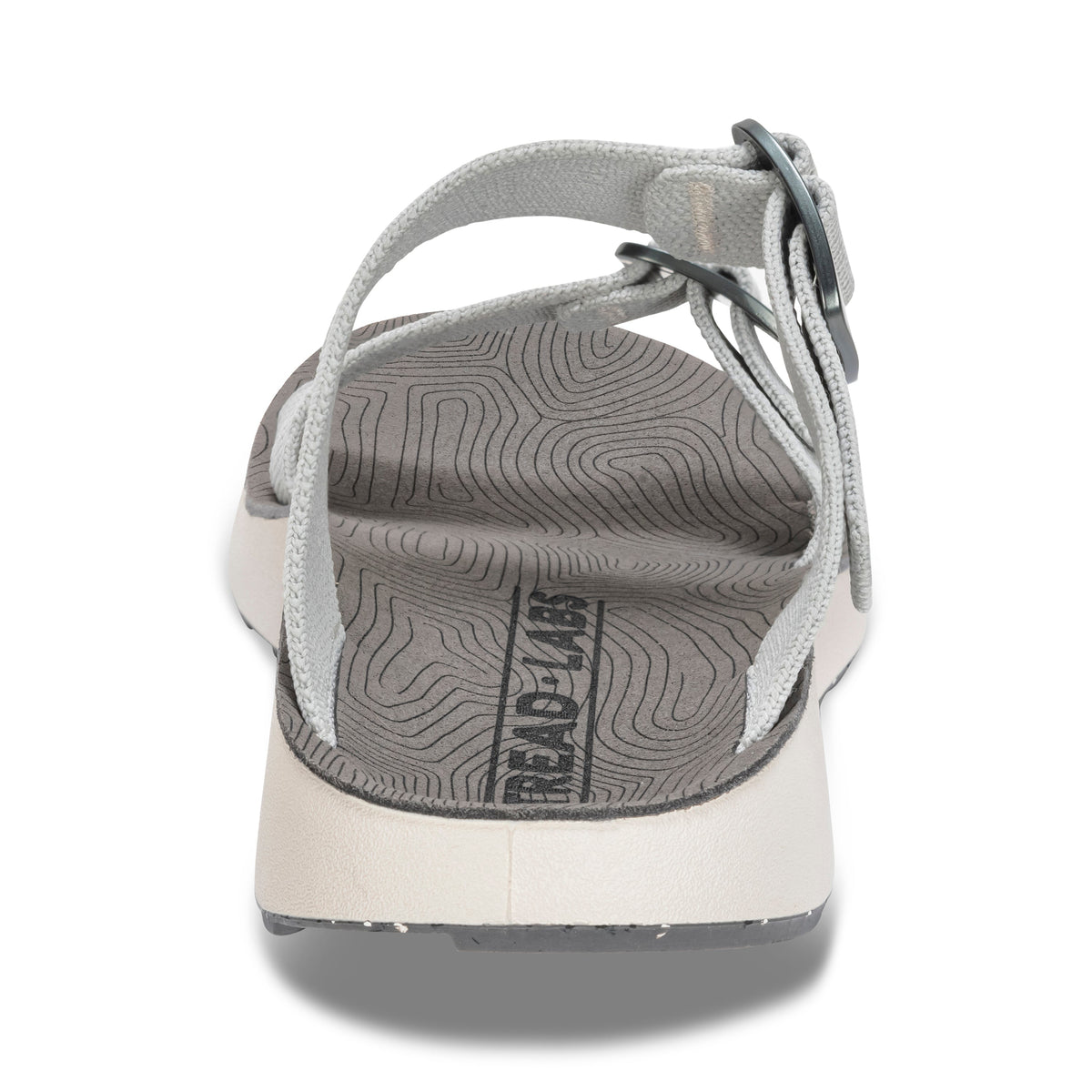Back heel view of Tread Labs Salinas Slide sandal in Mirage grey showing textured arch support footbed