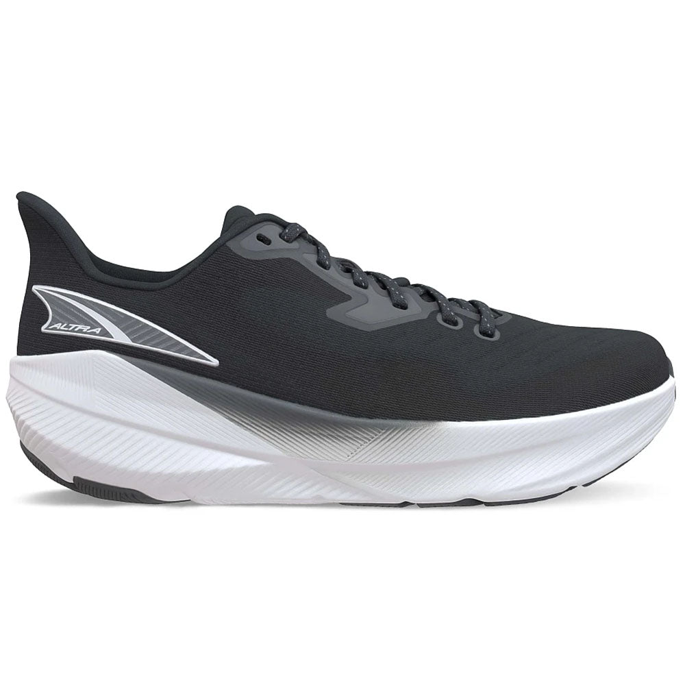 Side view on white background of Womens Altra Experience running shoe in Black/White, Medium (Regular) width
