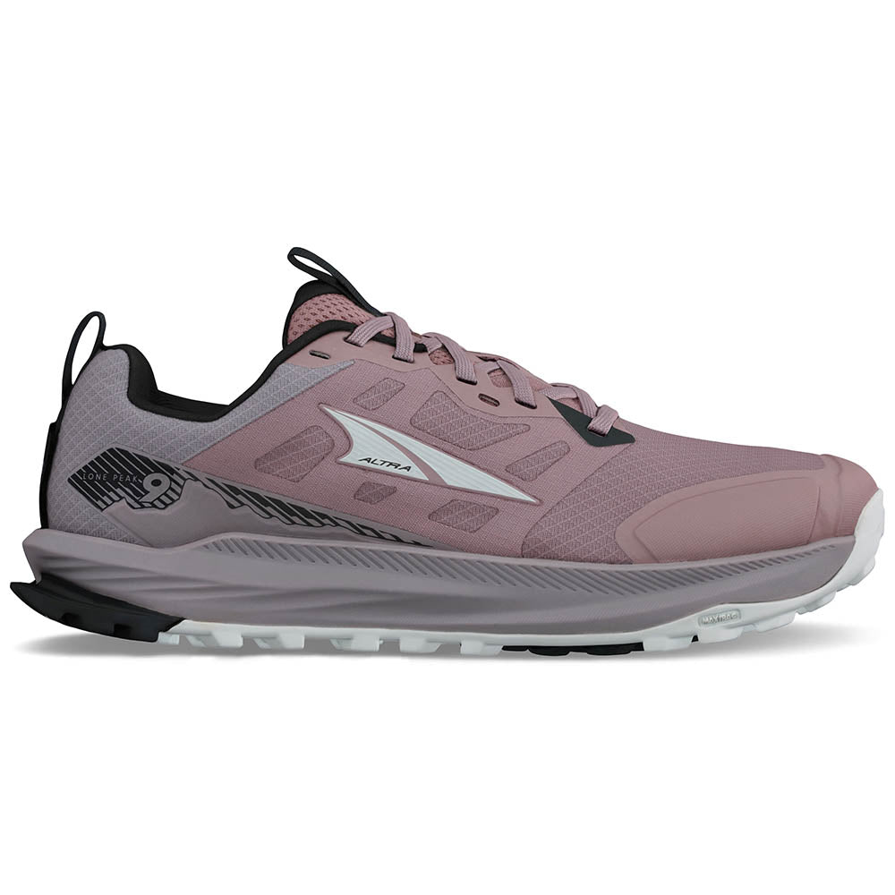 Side view on white background of Womens Altra Lone Peak running shoe in Purple, Wide width