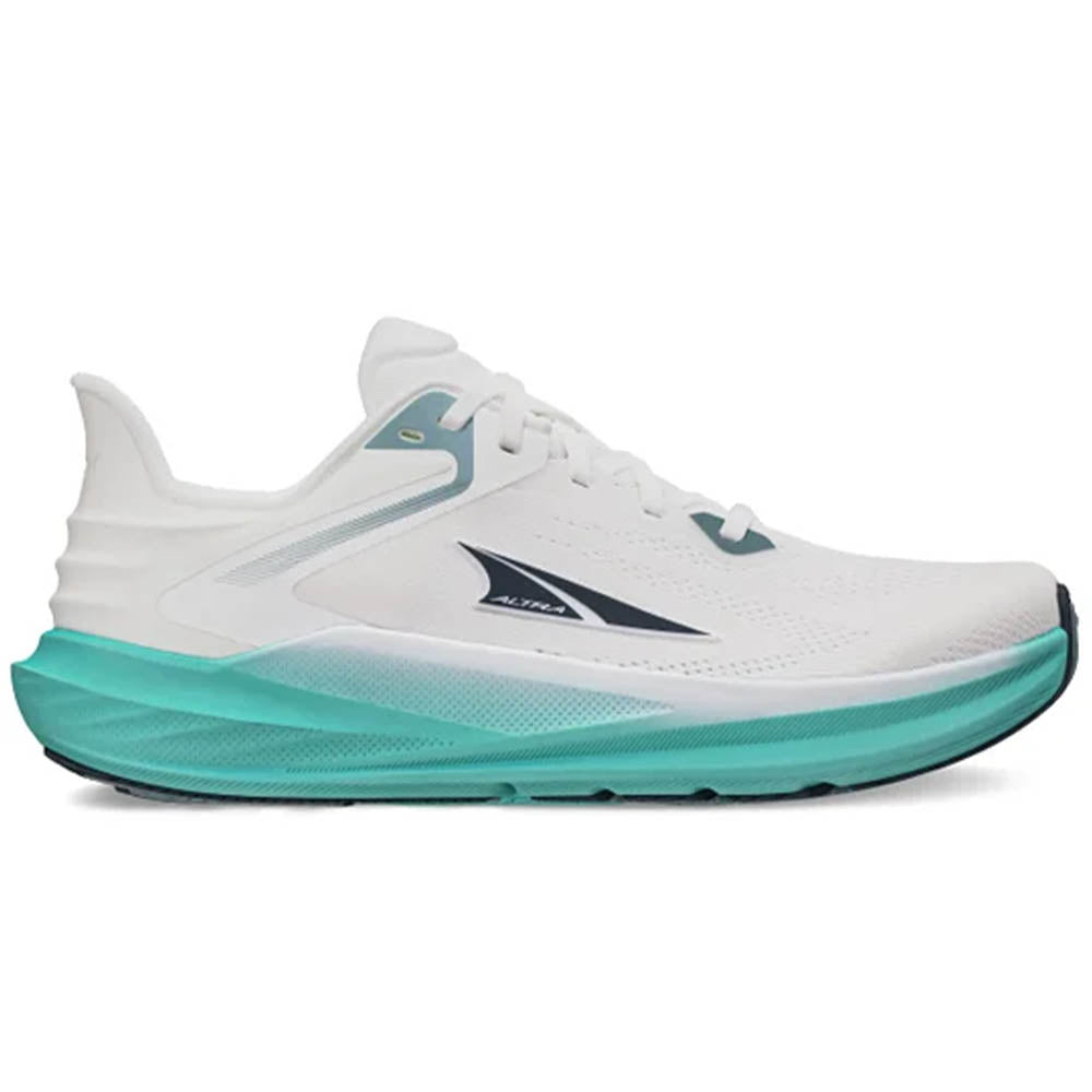 Side view on white background of Womens Altra Torin running shoe in White/Green, Medium (Regular) width