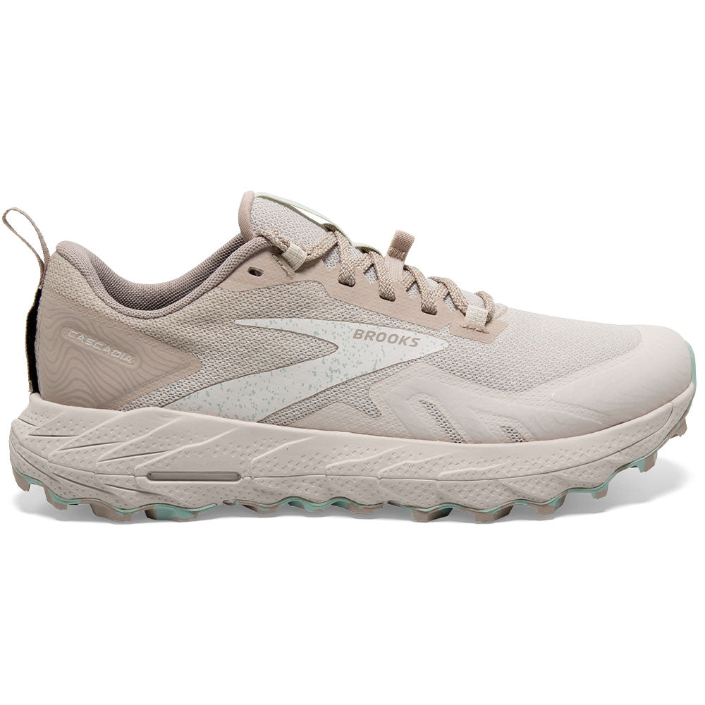 Side view on white background of Womens Brooks Cascadia running shoe in White Sand/Chateau Grey, Medium (Regular) width
