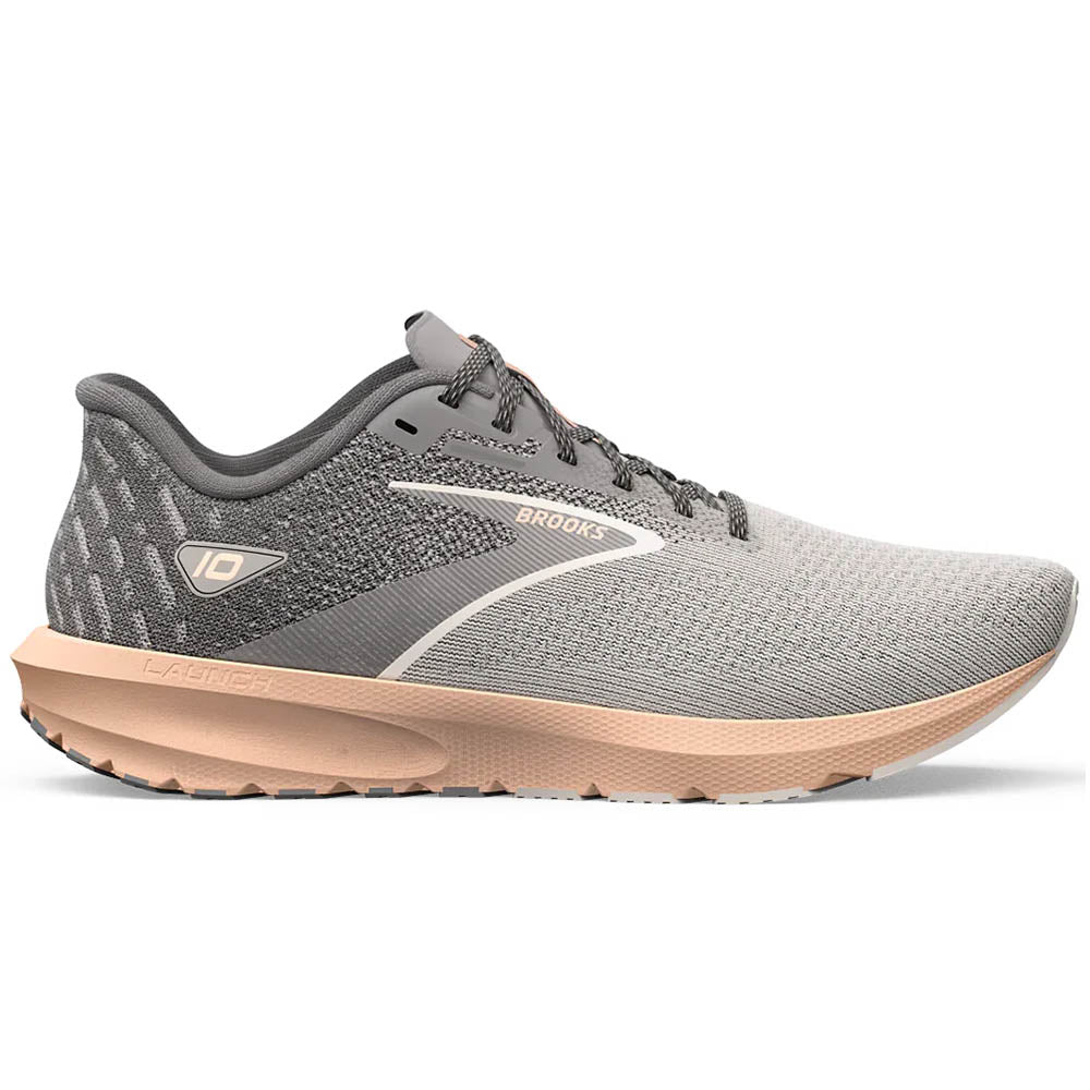 Side view on white background of Womens Brooks Launch running shoe in Grey/Crystal Grey/Pale Peach, Medium (Regular) width