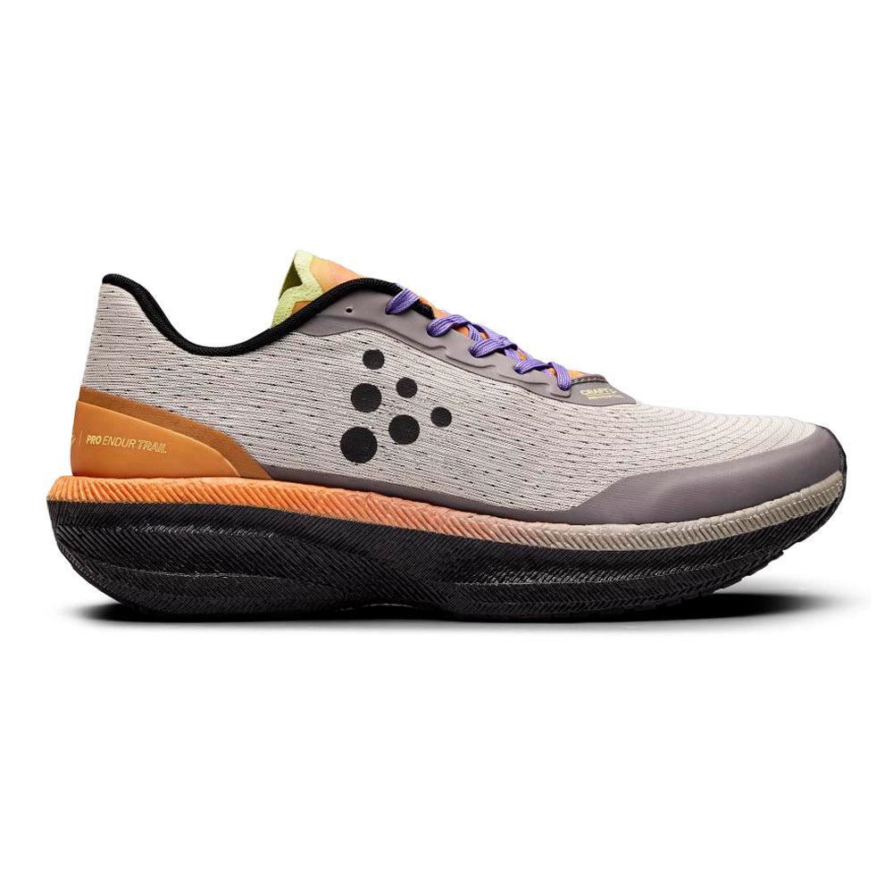 Side view on white background of Womens Craft Endurance Trail running shoe in Flex/Dawn, Medium (Regular) width