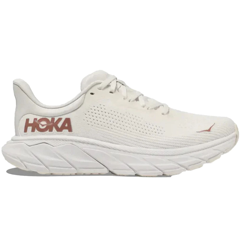 Side view on white background of Womens Hoka Arahi running shoe in Blanc De Blanc/Rose Gold, Medium (Regular) width