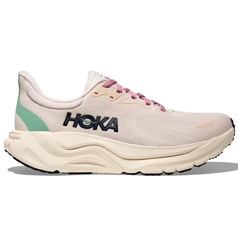 Side view on white background of Womens Hoka Arahi running shoe in Rose Cream/Alabaster, Medium (Regular) width