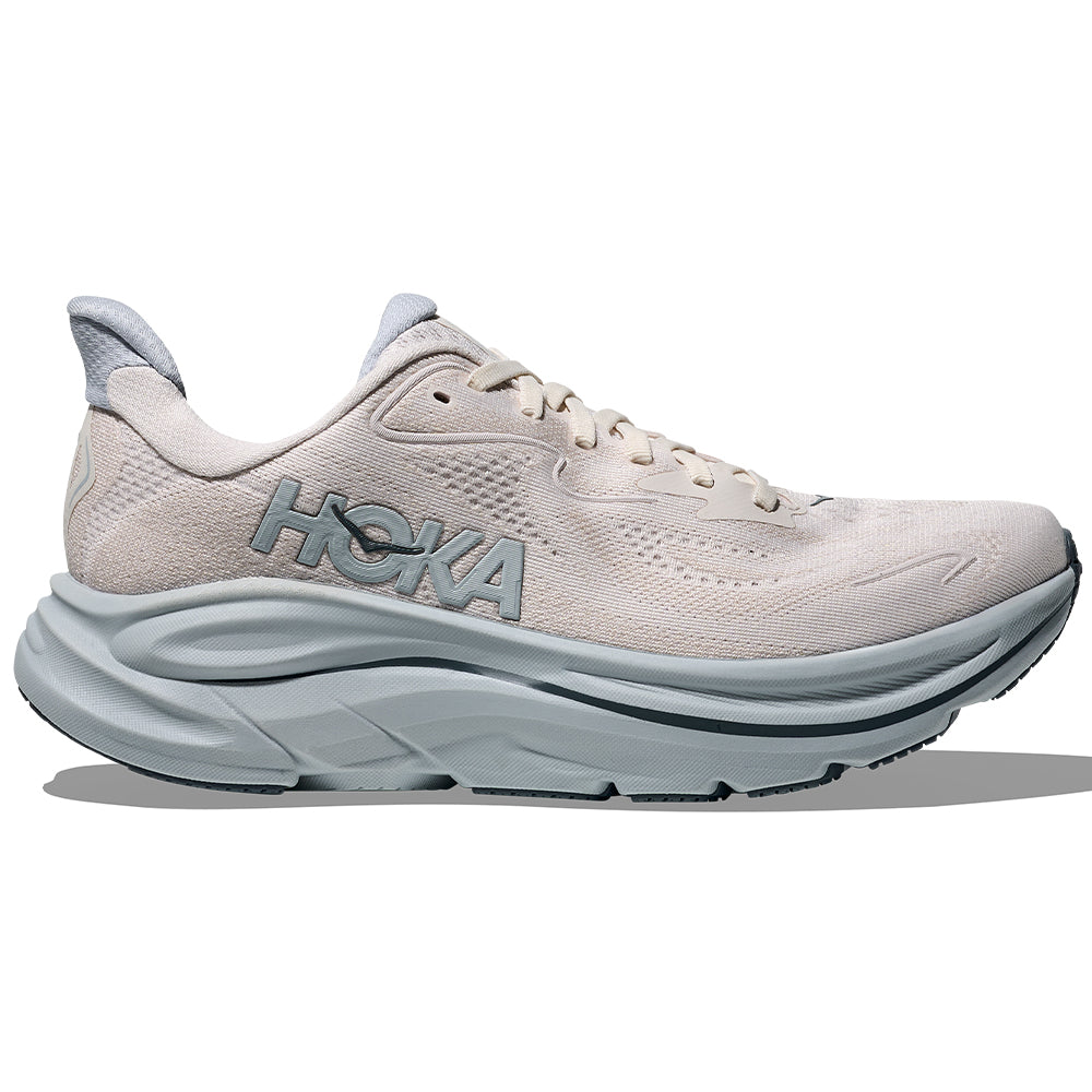 Side view on white background of Womens Hoka Clifton running shoe in Grout/Mineral Blue, Medium (Regular) width