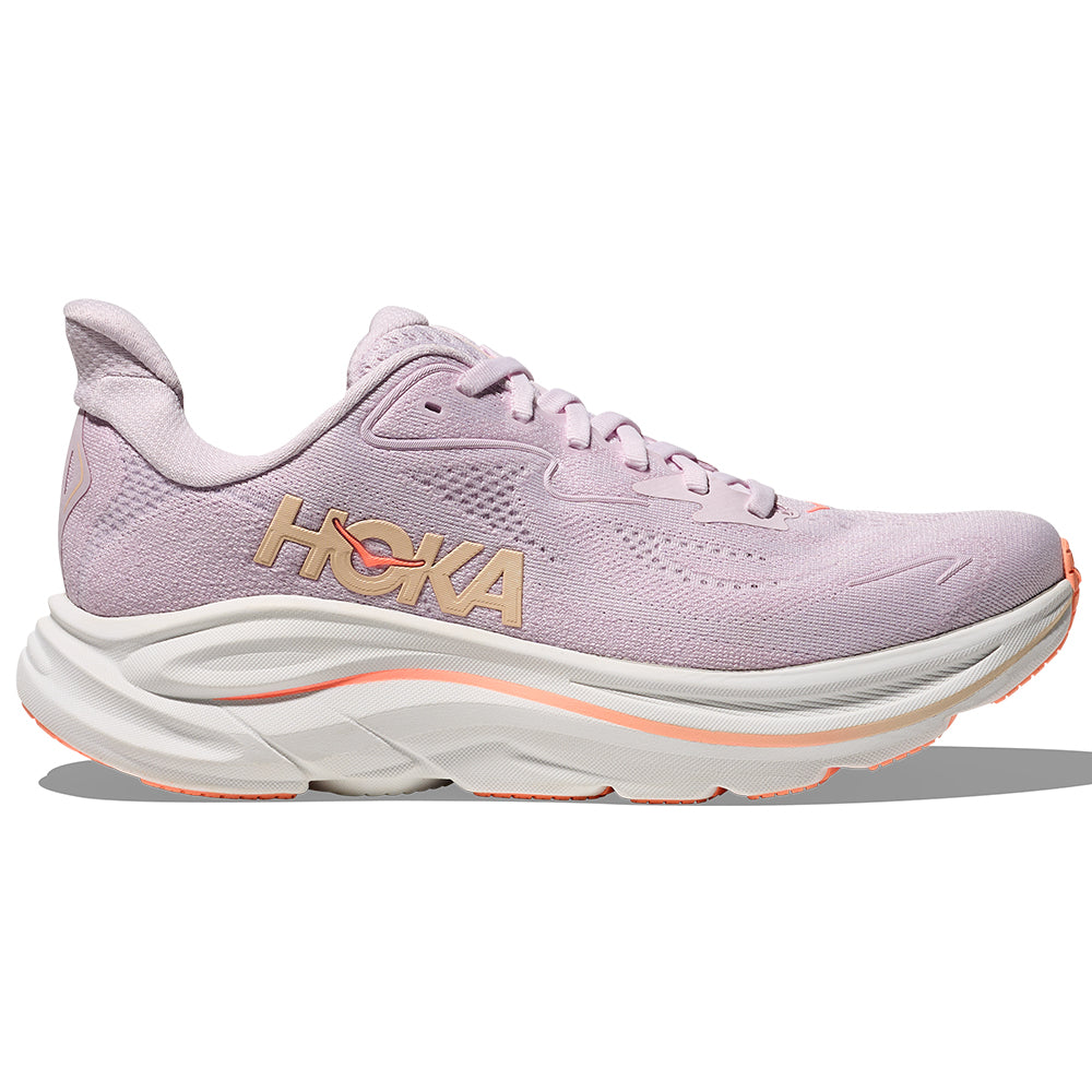 Side view on white background of Womens Hoka Clifton running shoe in Lilac Cream/Tangerine Glow, Medium (Regular) width
