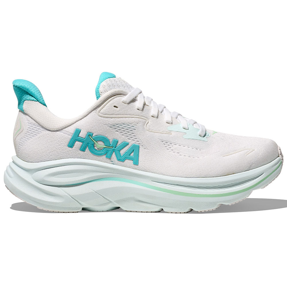 Side view on white background of Womens Hoka Clifton running shoe in White/Cielo Blue, Medium (Regular) width
