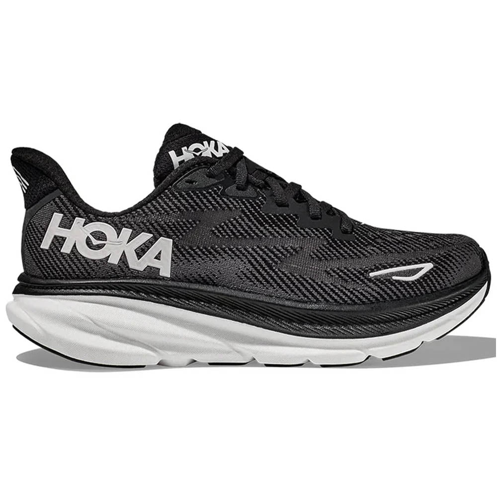 Side view on white background of Womens Hoka Clifton running shoe in Black/White, Medium (Regular) width