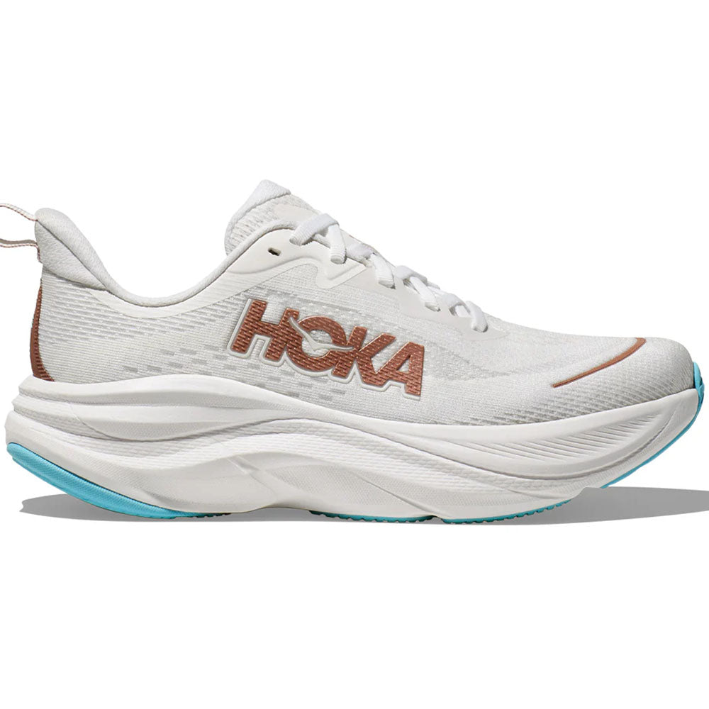 Side view on white background of Womens Hoka Skyflow running shoe in Frost/Rose Gold, Medium (Regular) width