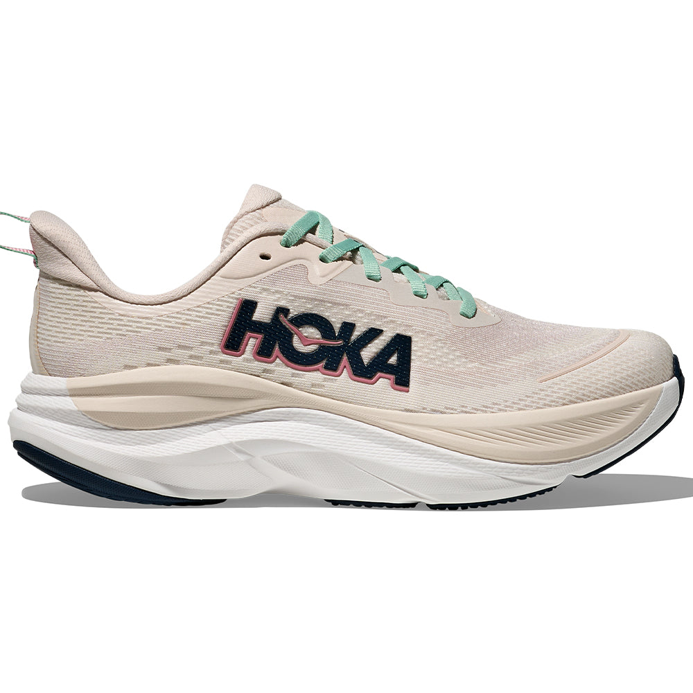 Side view on white background of Womens Hoka Skyflow running shoe in Rose Cream/Alabaster, Medium (Regular) width
