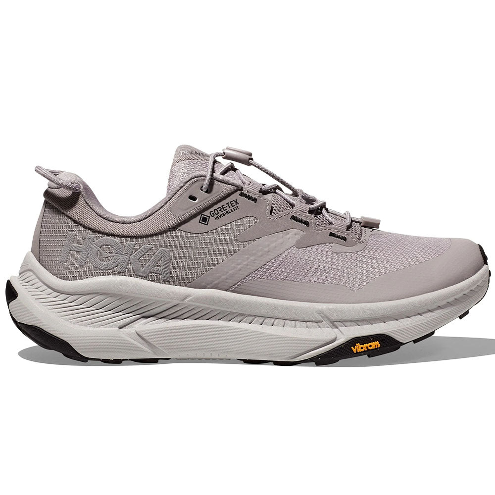 Side view on white background of Womens Hoka Transport running shoe in Opal/Vaporous, Medium (Regular) width