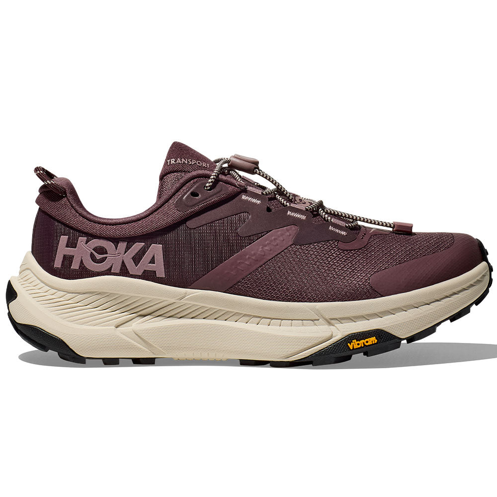 Side view on white background of Womens Hoka Transport running shoe in Smoky Quartz/Oat Milk, Medium (Regular) width