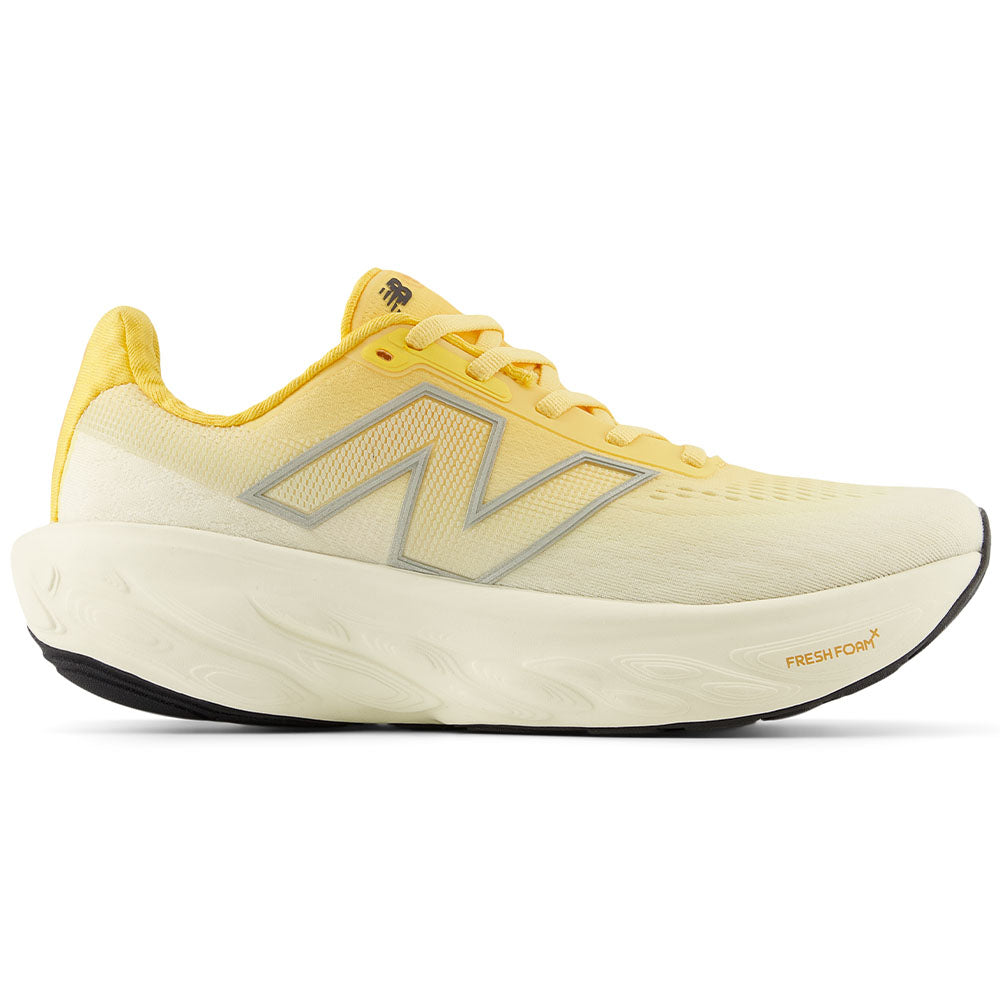 Side view on white background of Womens New Balance Fresh Foam X 1080 running shoe in Clementine/Angora/Dried Apricot, Wide width