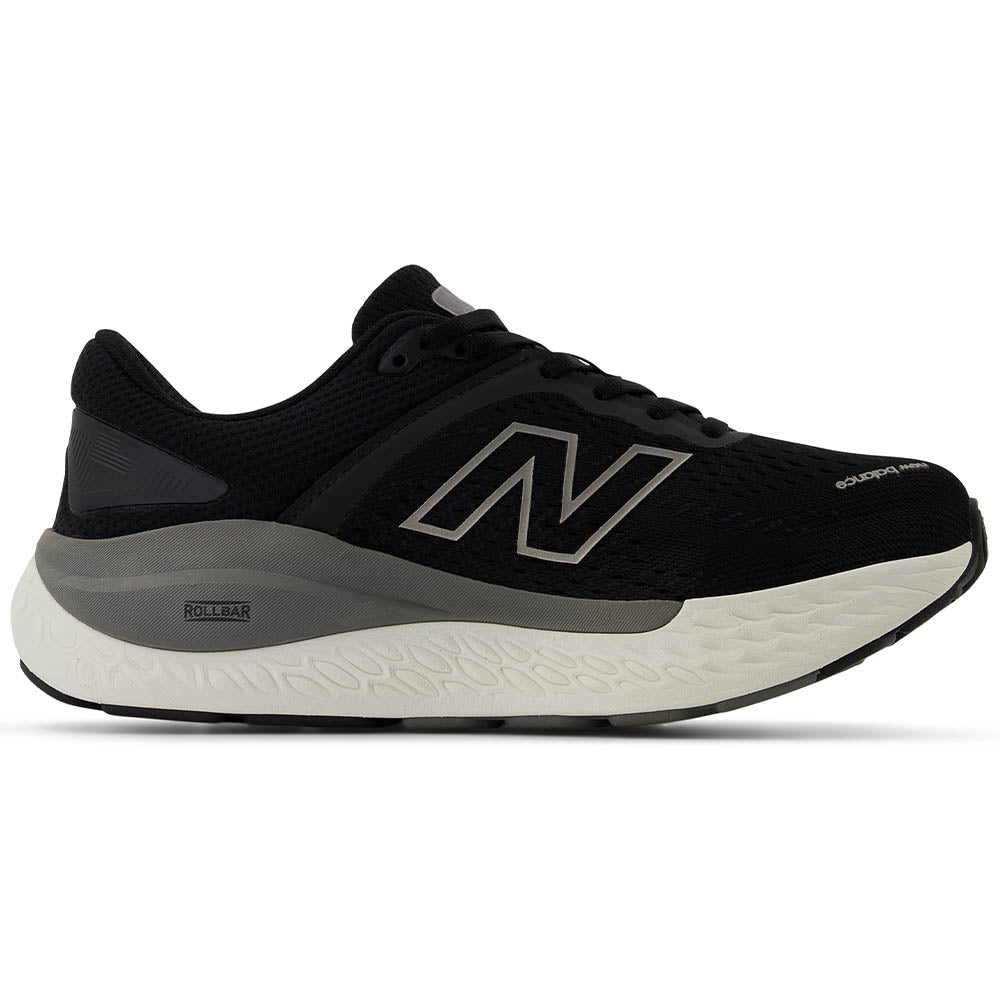 Side view on white background of Womens New Balance Fresh Foam 1540 running shoe in Black/Harbor Gray, Wide width