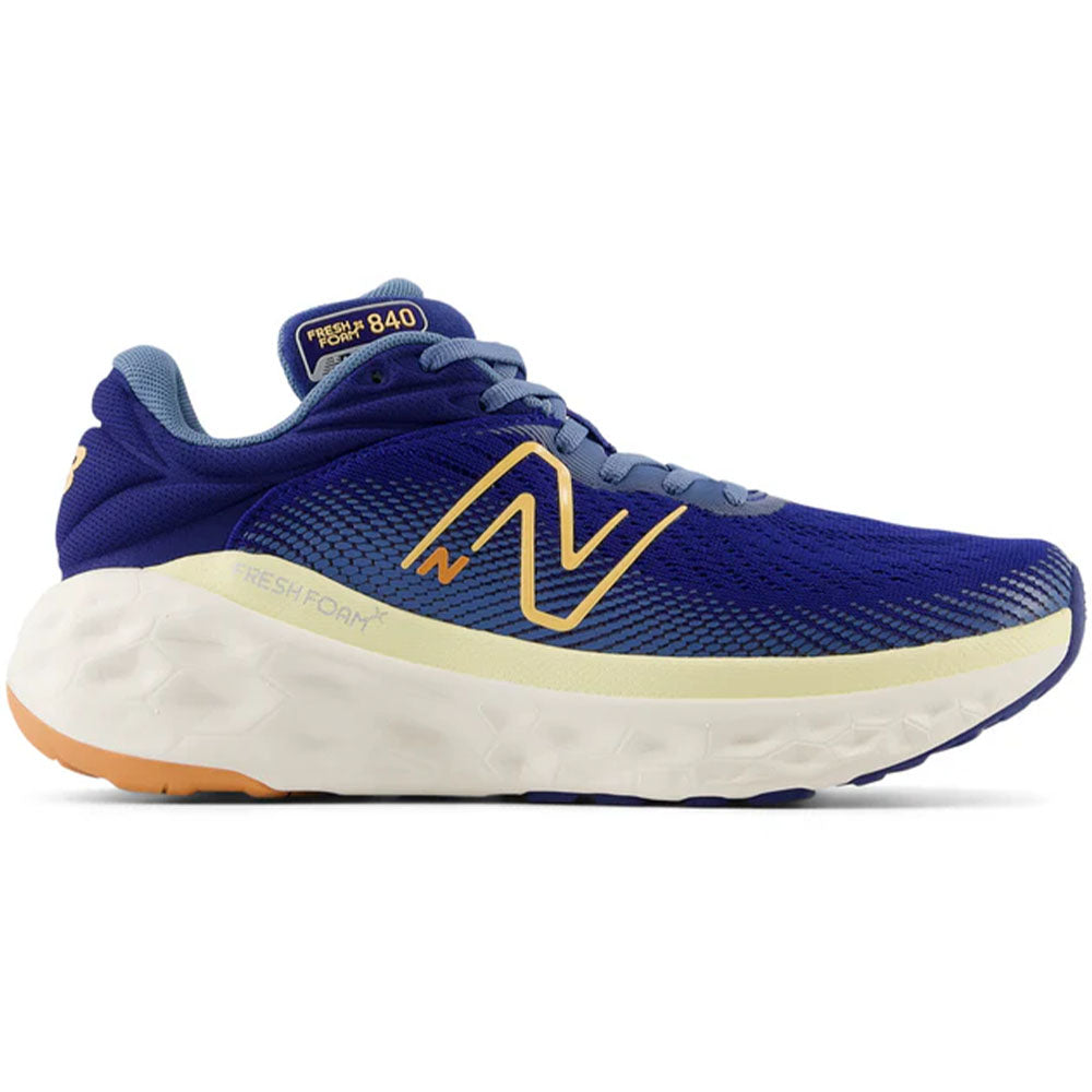Side view on white background of Womens New Balance Fresh Foam X 840 running shoe in Inkwell/Heron Blue/Peach Blossom, Wide width