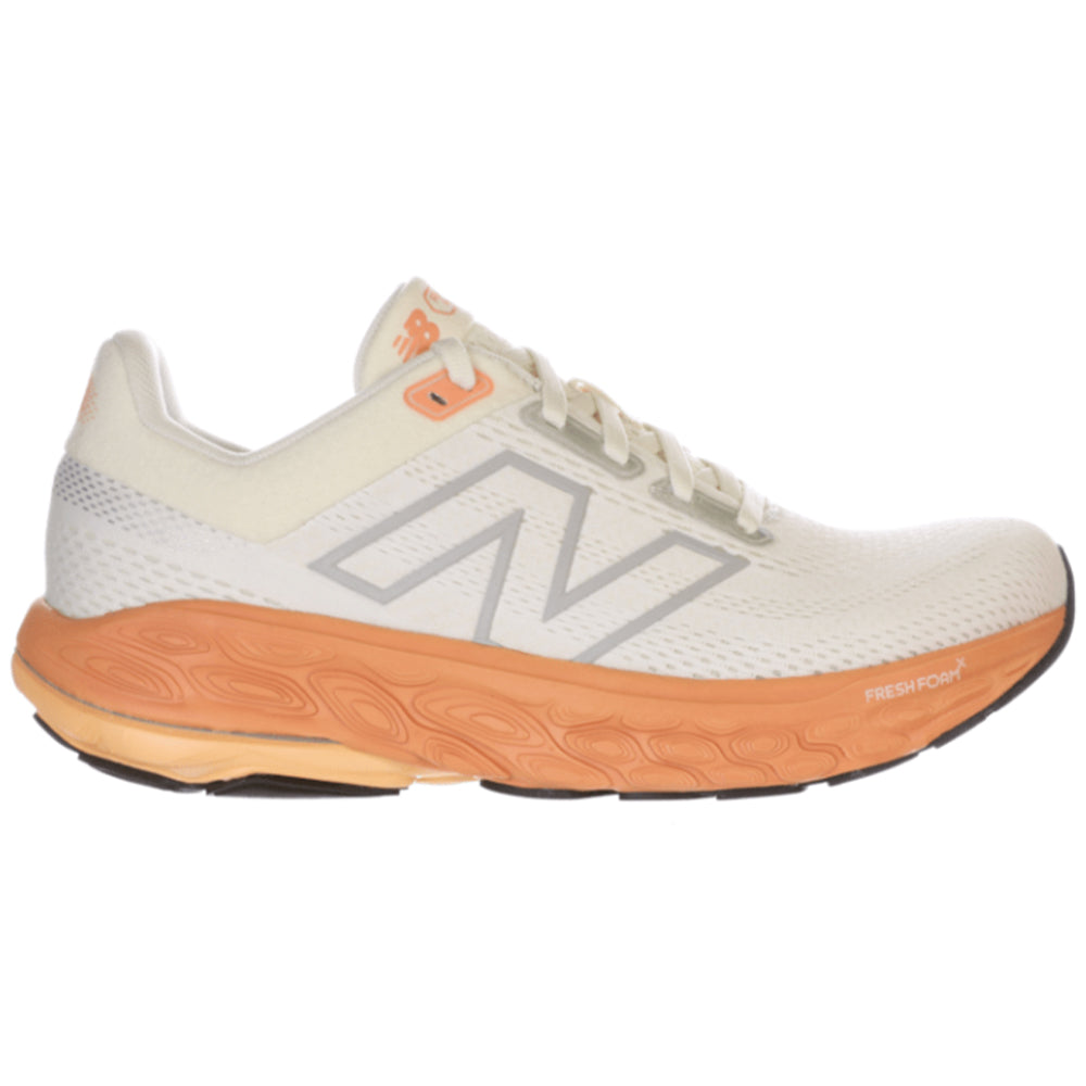 Side view on white background of Womens New Balance Fresh Foam 860 running shoe in NB 103 White/Angora/Peach Nectar, Wide width