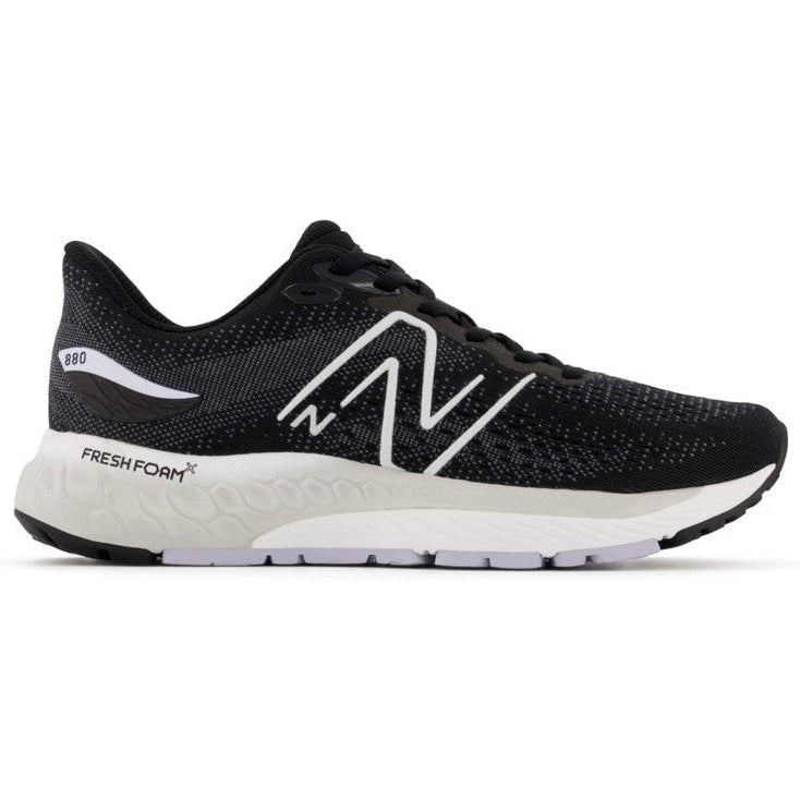 Side view on white background of Womens New Balance Fresh Foam X 880v12 running shoe in Black/Violet Haze, Wide width