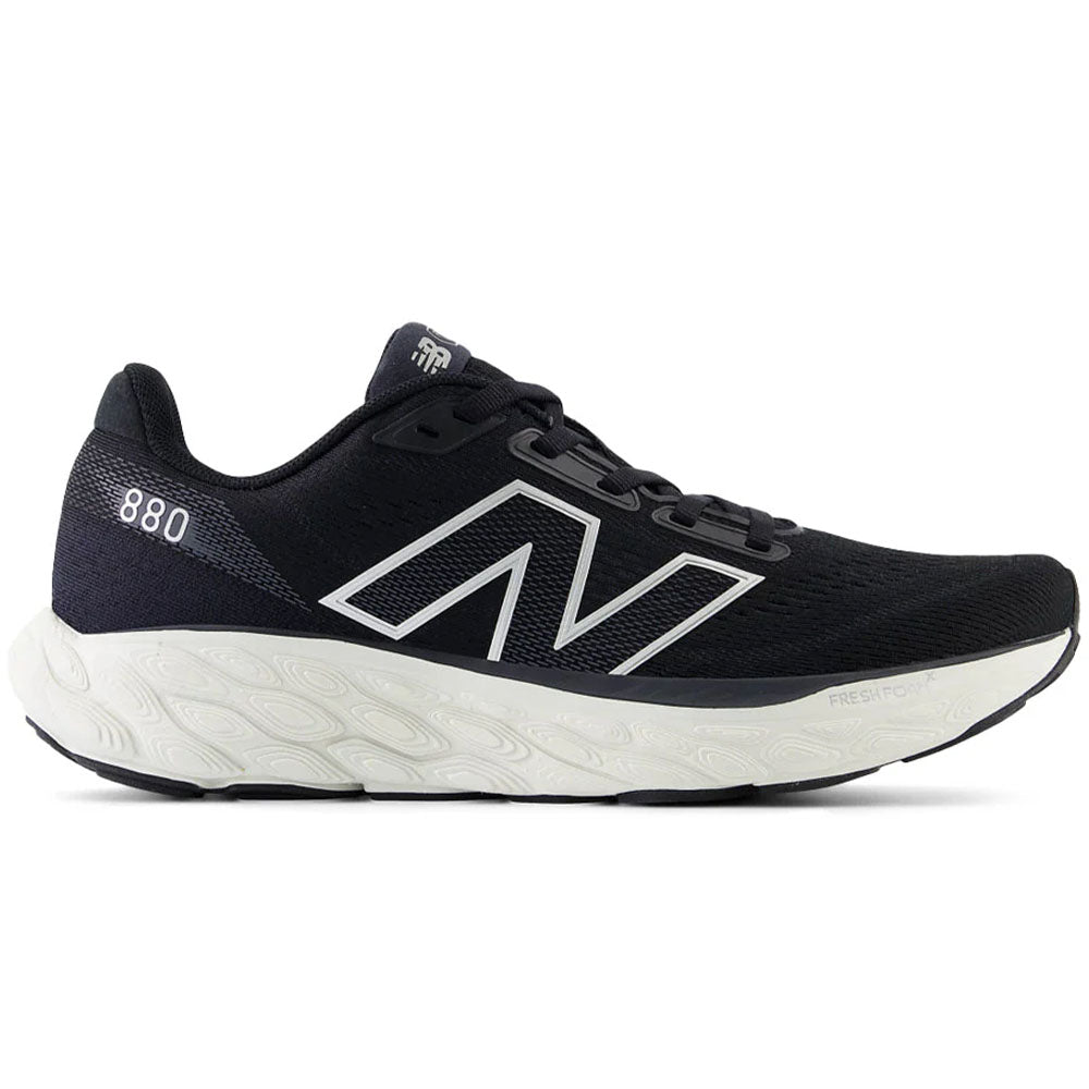 Side view on white background of Womens New Balance Fresh Foam 880 running shoe in Black/Sea Salt/Silver Metallic, Medium (Regular) width
