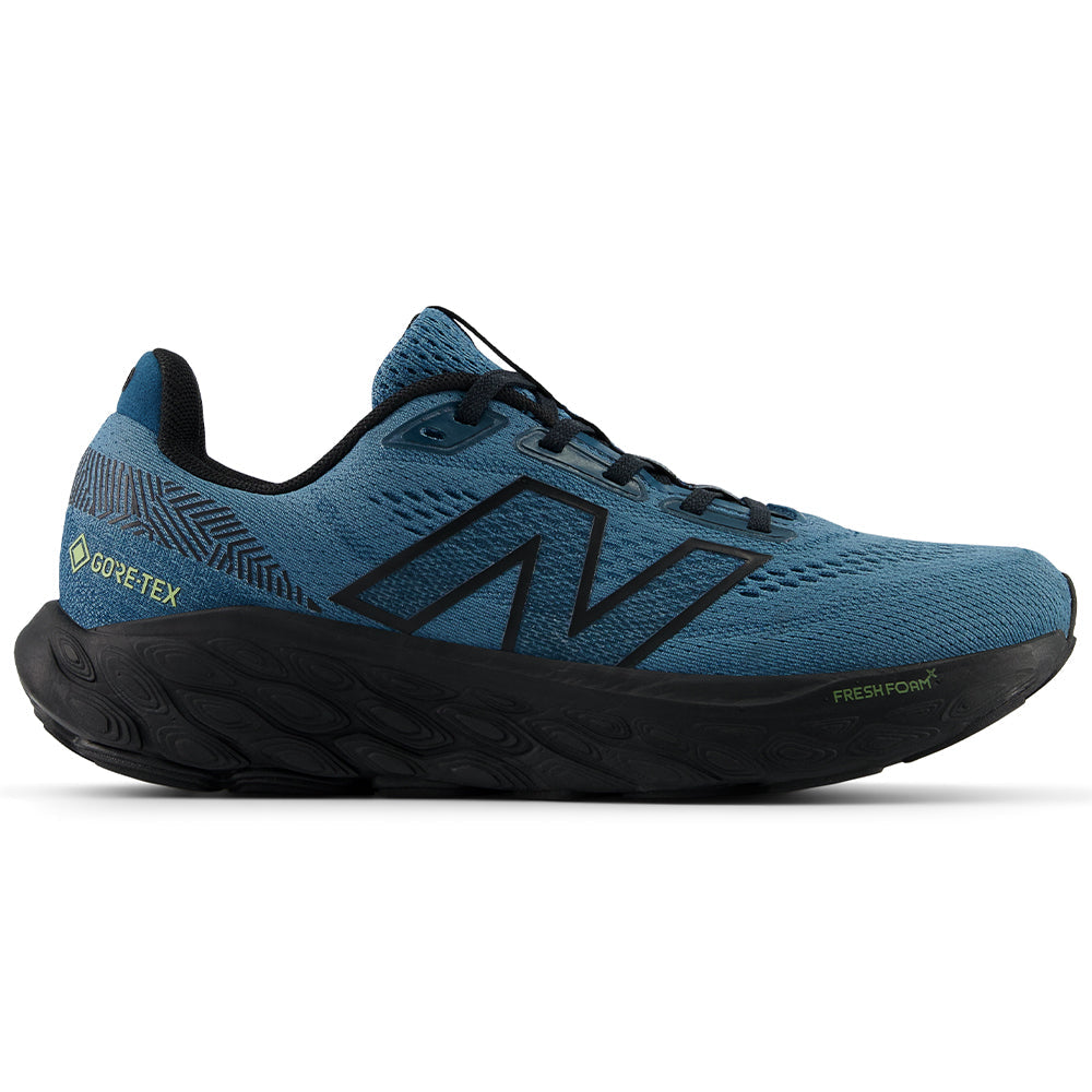 Side view on white background of Womens New Balance Fresh Foam X 880 running shoe in Terrarium/Black/Deep Sea, Medium (Regular) width