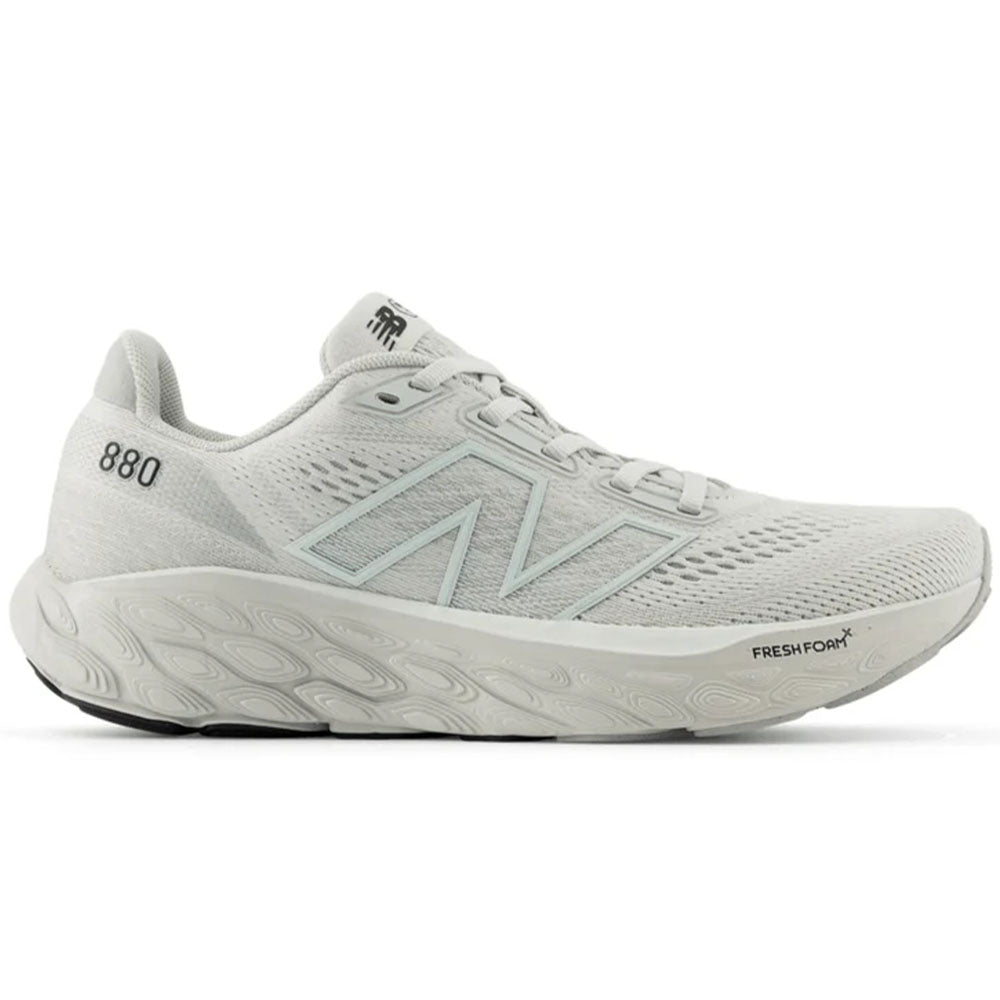 Side view on white background of Womens New Balance Fresh Foam 880 running shoe in Grey Matter/Raincloud/Reflection, Medium (Regular) width