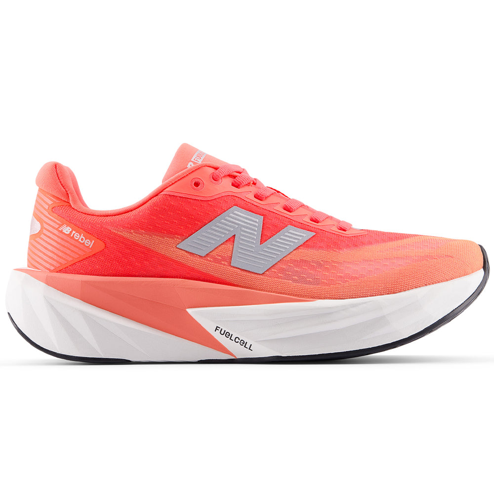 Side view on white background of Womens New Balance FuelCell Rebel running shoe in Urgent Red/NB 103 White/Silver Metallic, Medium (Regular) width