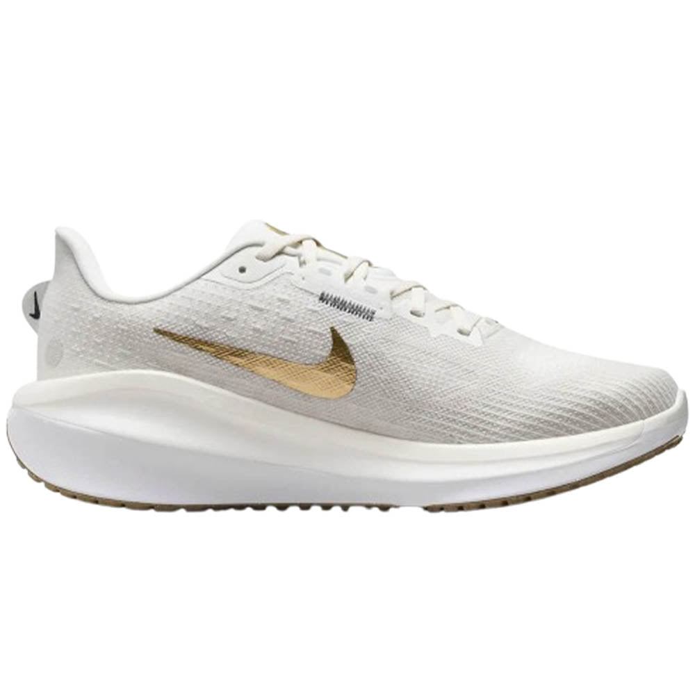 Side view on white background of Womens Nike Vomero running shoe in Phantom/Metallic Gold/Light Bone/Sail, Medium (Regular) width