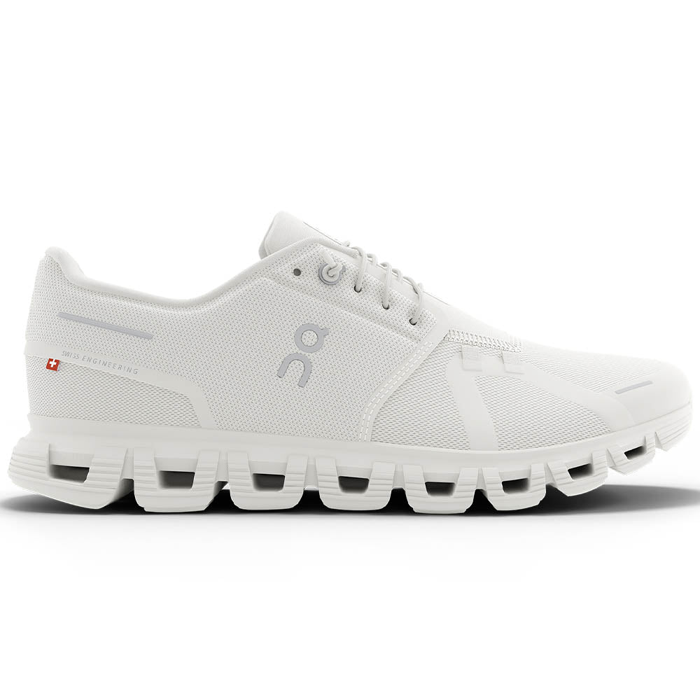 Side view on white background of Womens On Cloud 6 running shoe in White/White, Medium (Regular) width