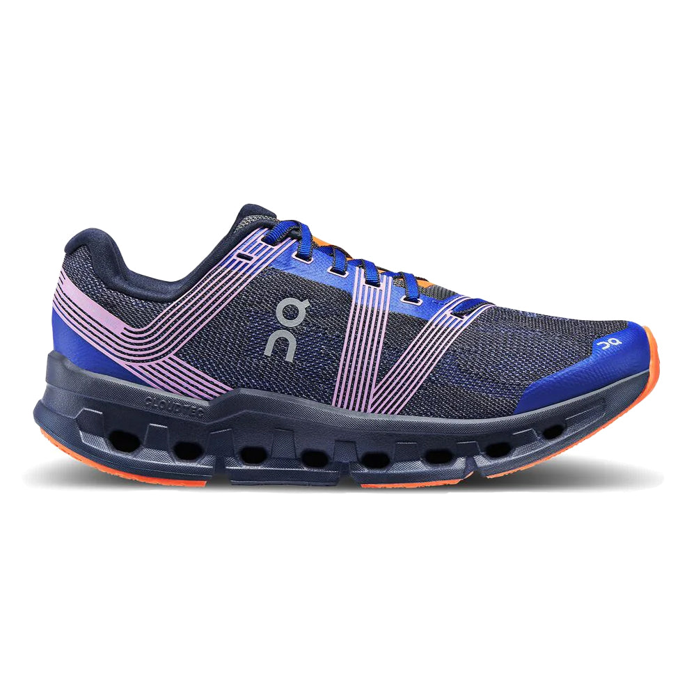 Side view on white background of Womens On Cloudgo running shoe in Indigo/Ink, Medium (Regular) width