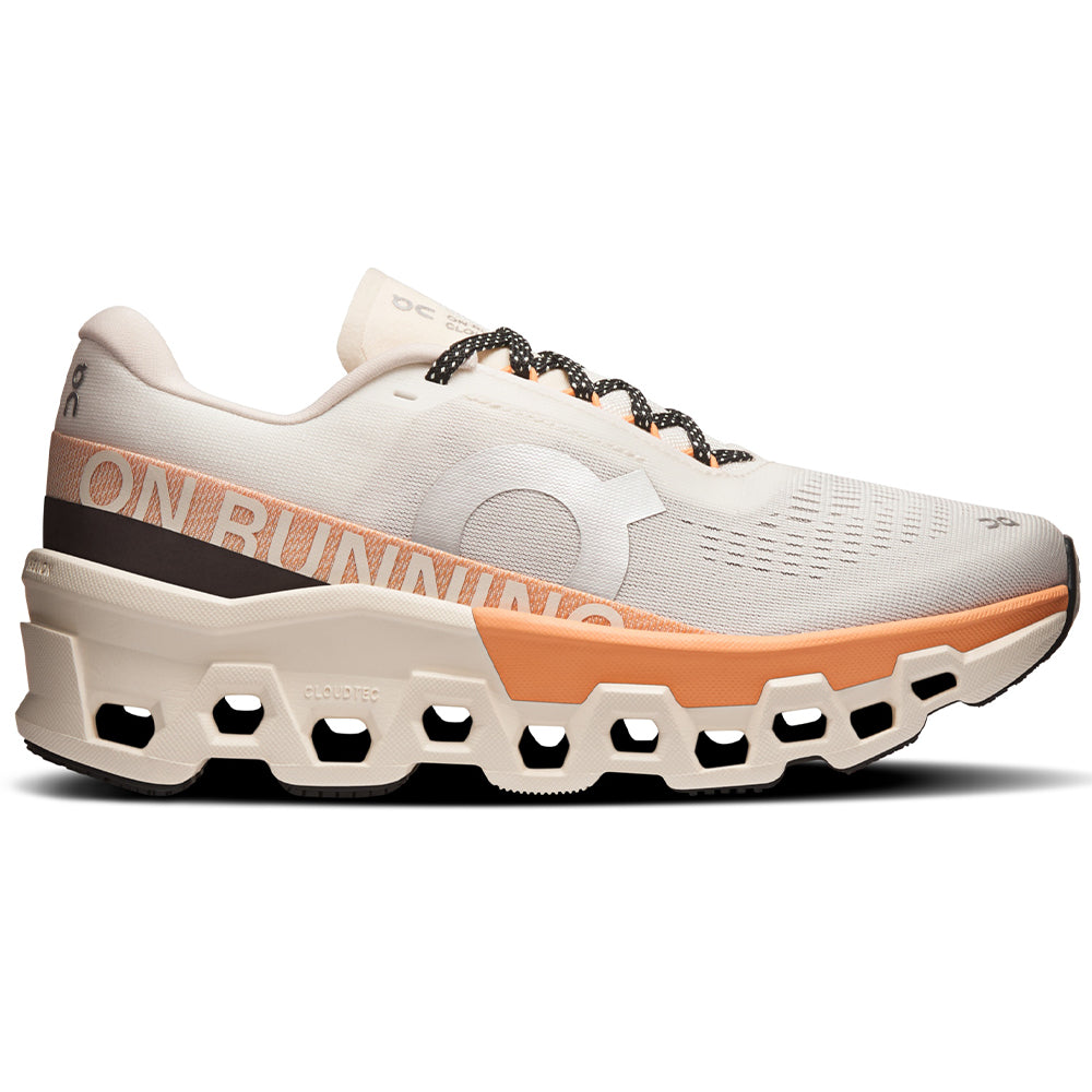 Side view on white background of Womens On Cloudmonster running shoe in Ivory/Tangerine, Medium (Regular) width