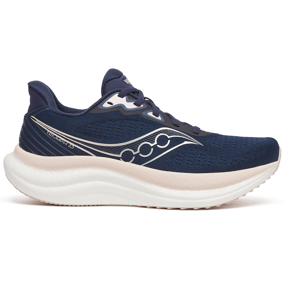 Side view on white background of Womens Saucony Triumph running shoe in Navy/Cameo, Medium (Regular) width