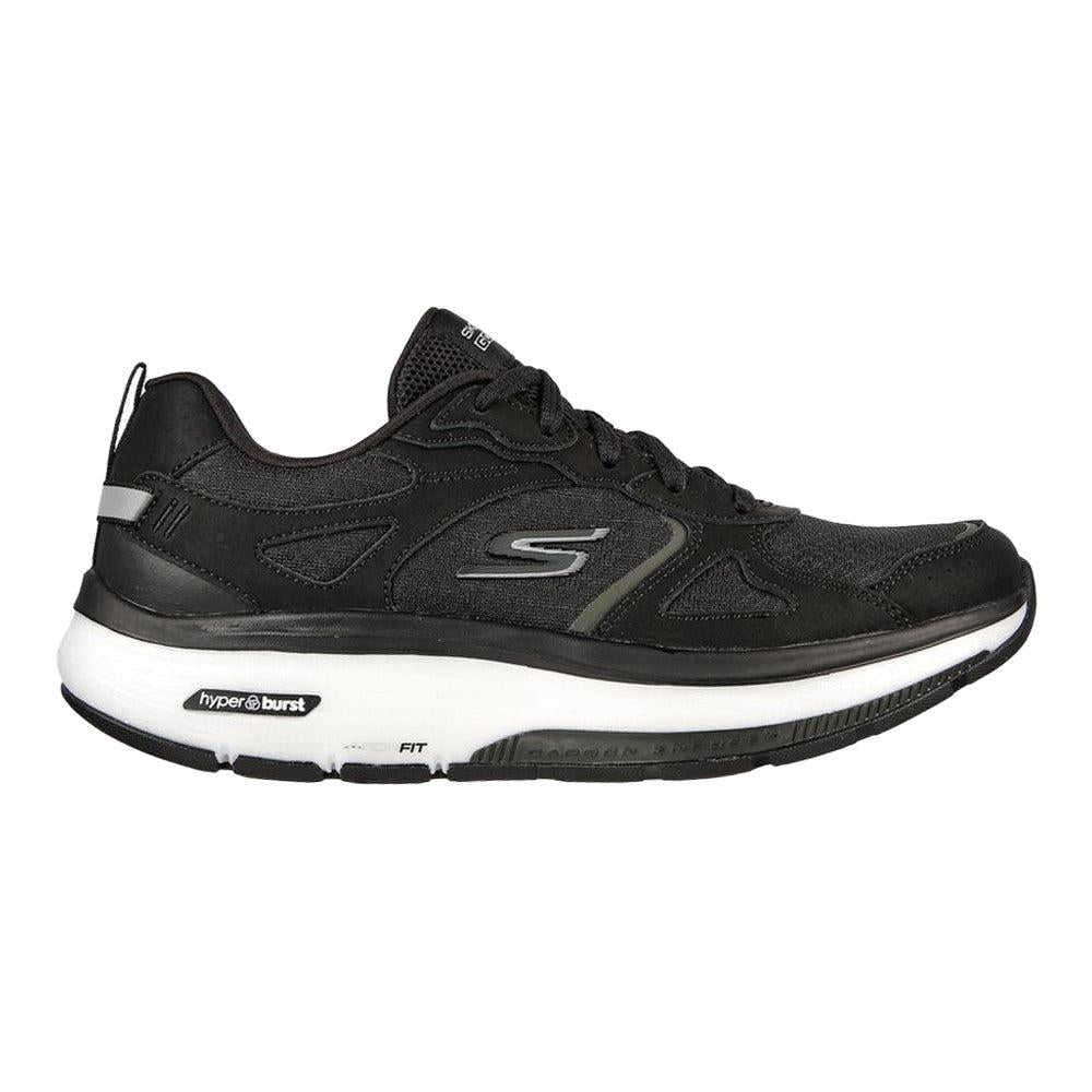 Side view on white background of Womens Skechers Go Walk running shoe in Black/White, Medium (Regular) width