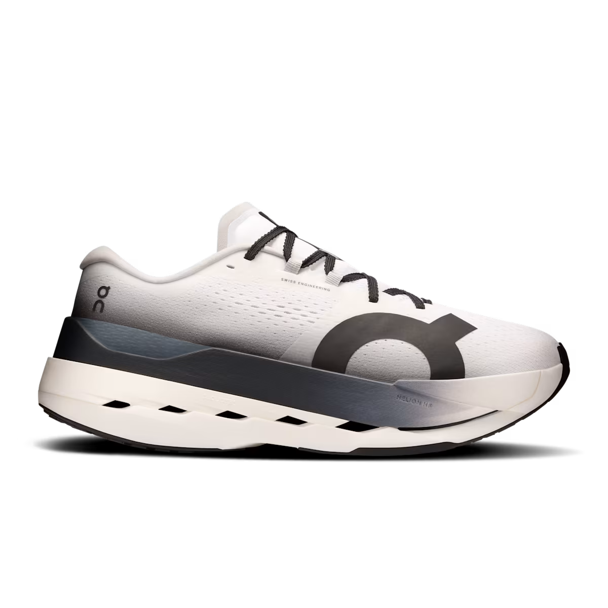 Side view on white background of Mens On Cloudboom Max running shoe in White/Black, Medium (Regular) width