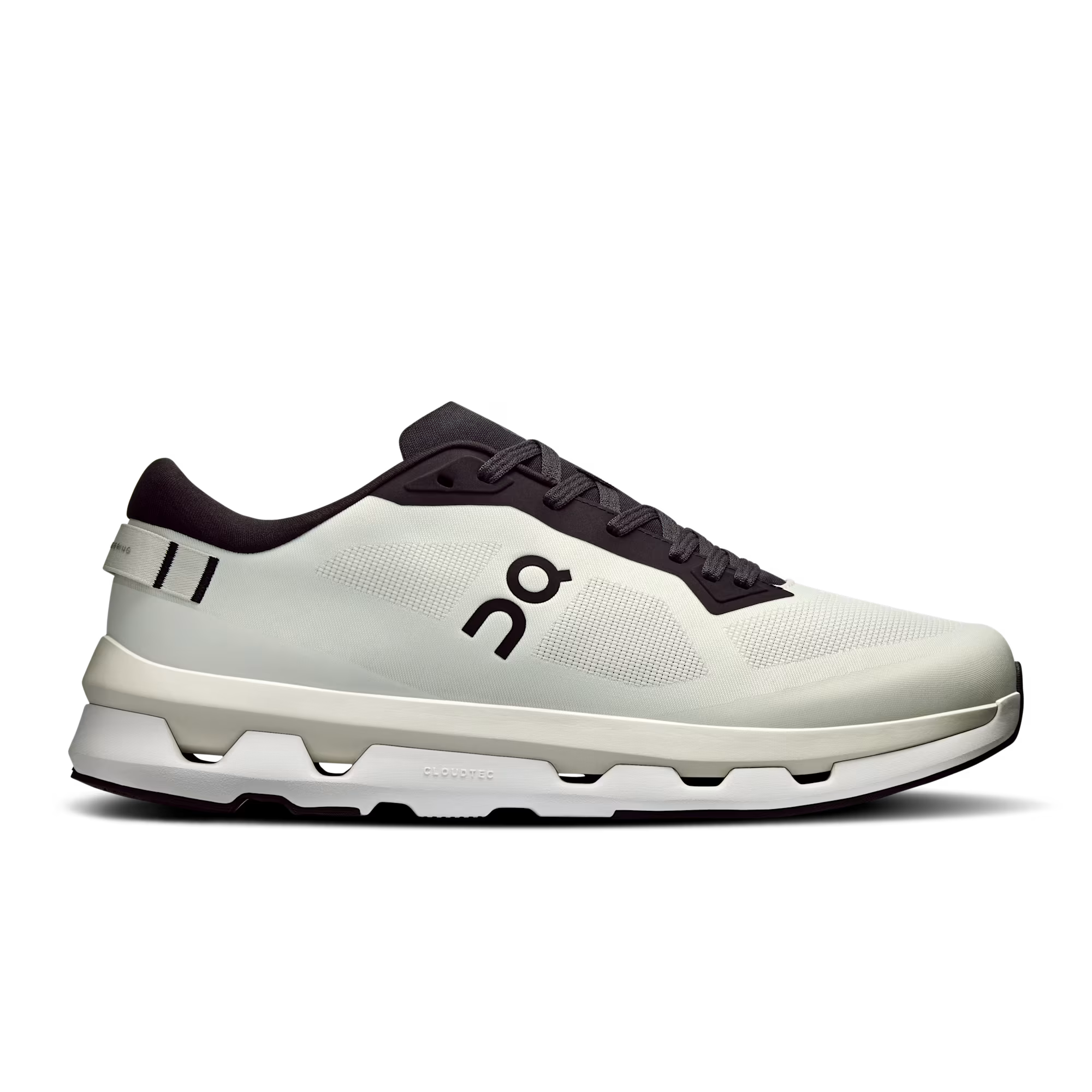 Side view on white background of Mens On Cloudzone running shoe in Ice/Black, Medium (Regular) width