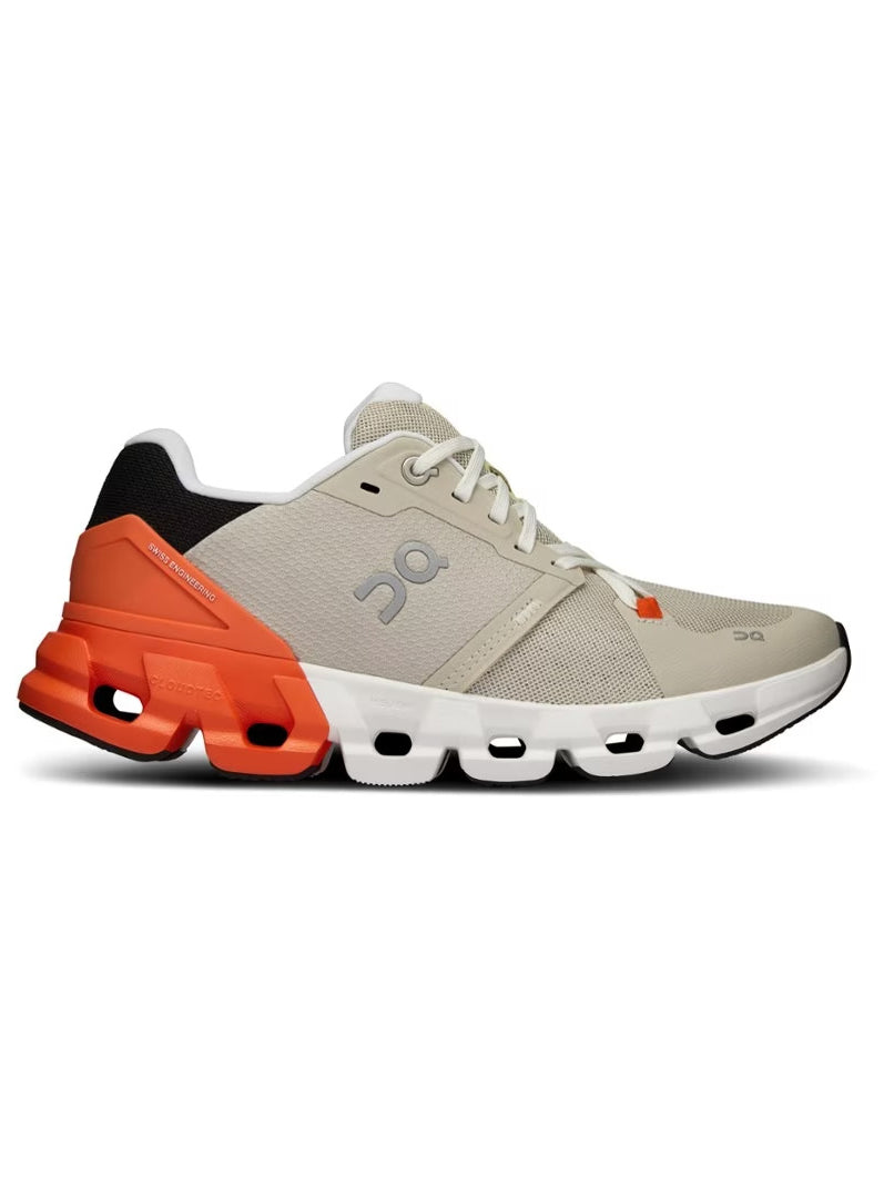 Side view on white background of Womens On Cloudflyer 4 running shoe in Sand/Flame, Medium (Regular) width
