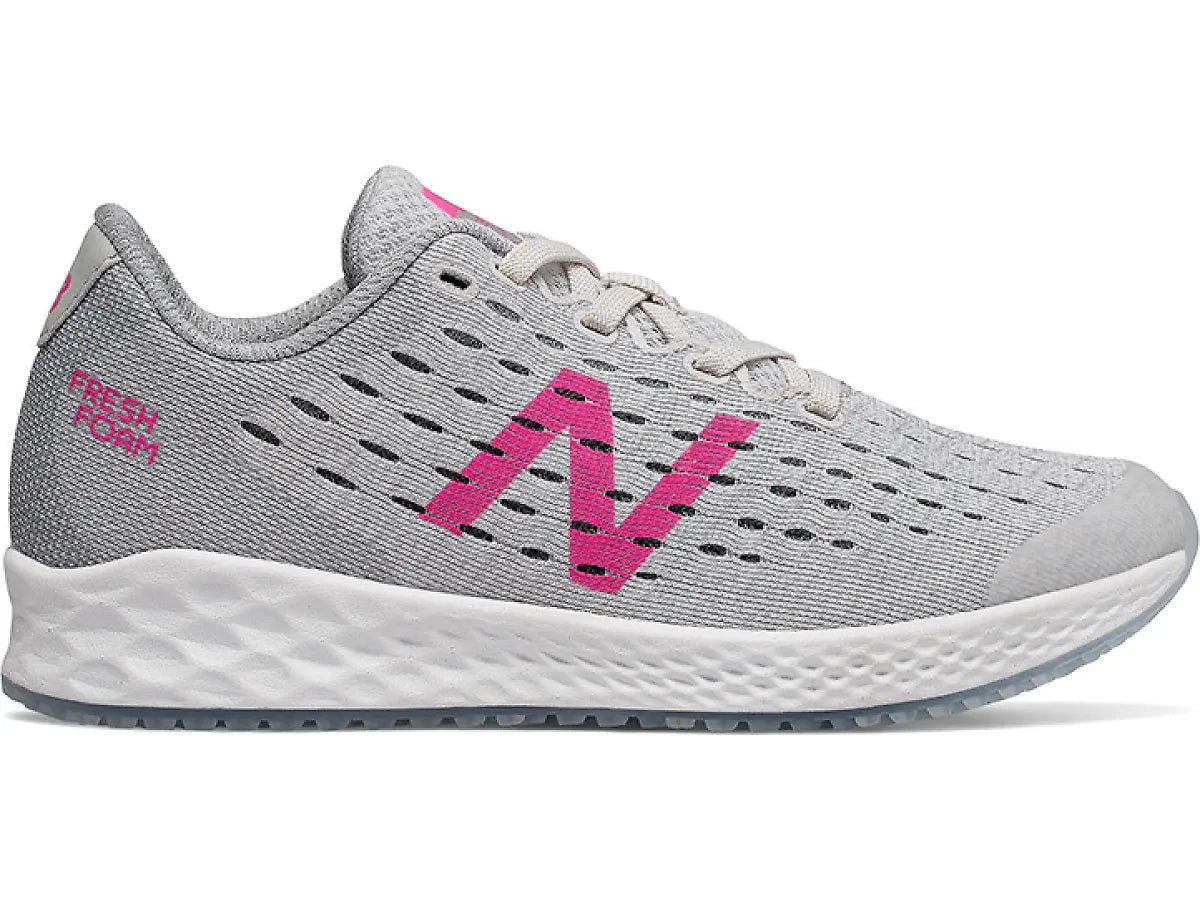 Side view on white background of Kids New Balance Fresh Foam Zante Pursuit V5 running shoe in Arctic Fox/Light Peony, Medium (Regular) width