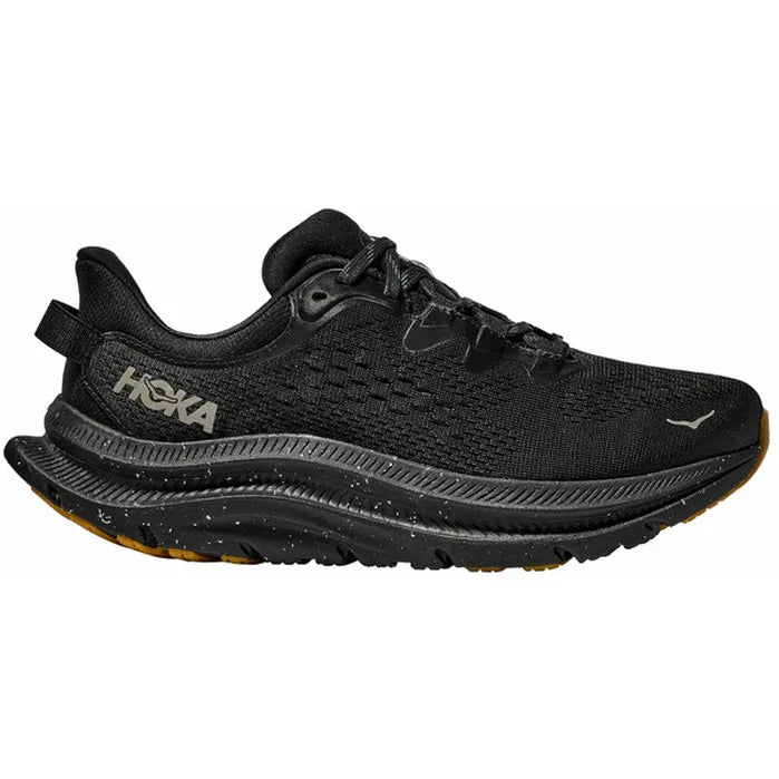 Side view on white background of Womens Hoka Kawana 2 running shoe in Black/Black, Medium (Regular) width
