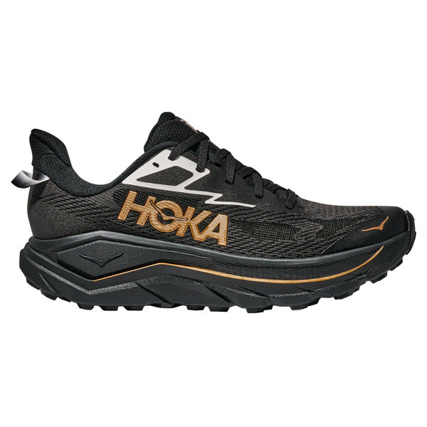 Side view on white background of Womens Hoka Challenger 8 running shoe in Black/Gold, Medium (Regular) width