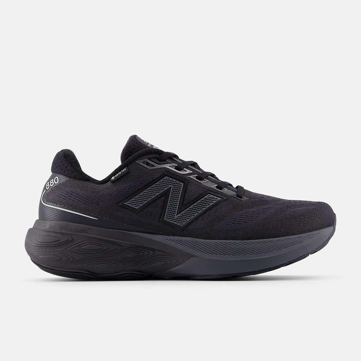 Side view on white background of Mens New Balance Fresh Foam X 880v15 GTX running shoe in Black/Castle Rock/Silver Metallic, Medium (Regular) width