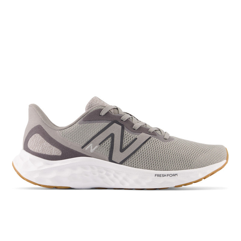 Side view on white background of Mens New Balance Fresh Foam Arishi v4 running shoe in Marblehead/Castlerock/Silver Metallic, Extra Wide width
