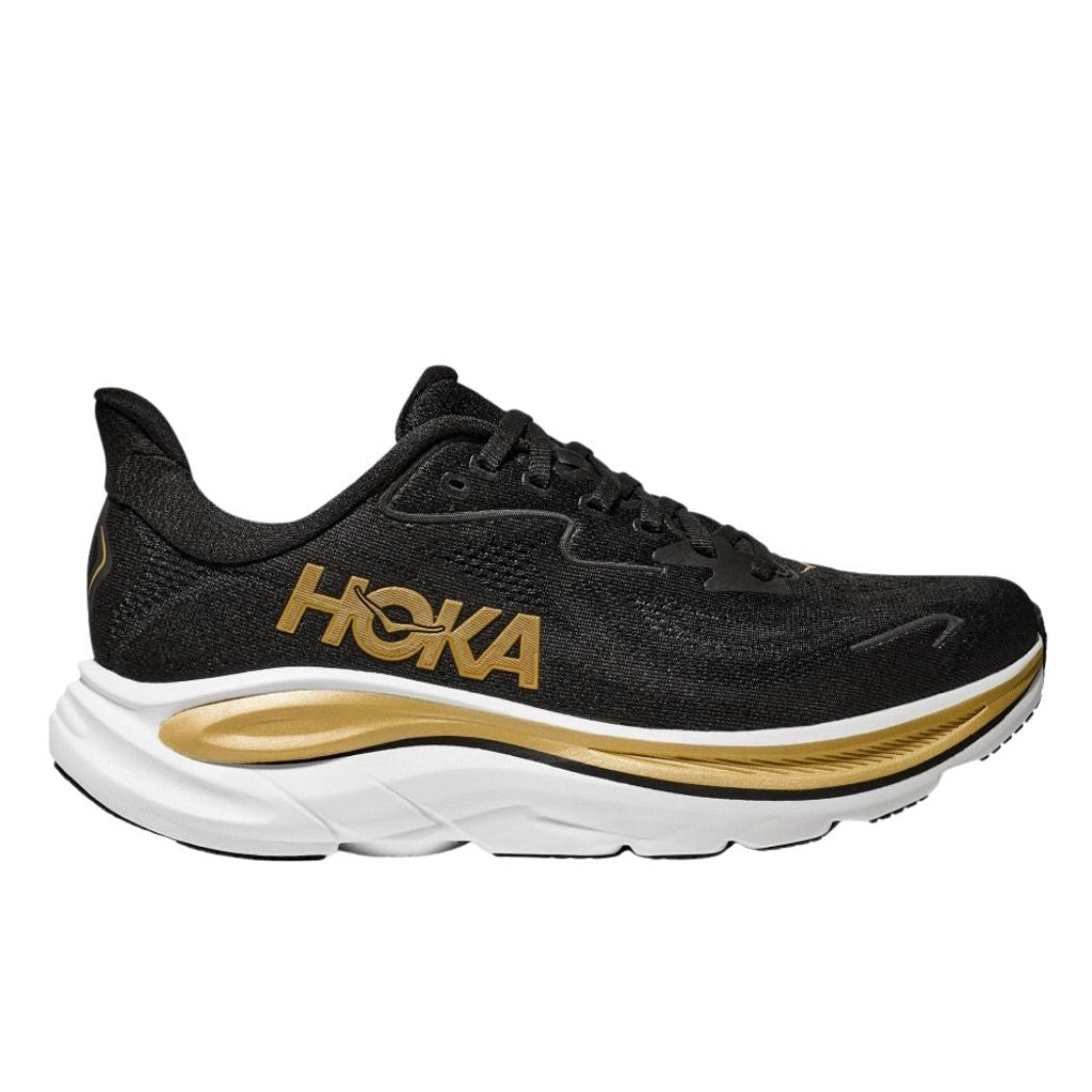Side view on white background of Mens Hoka Clifton 10 running shoe in Black/Gold, Medium (Regular) width