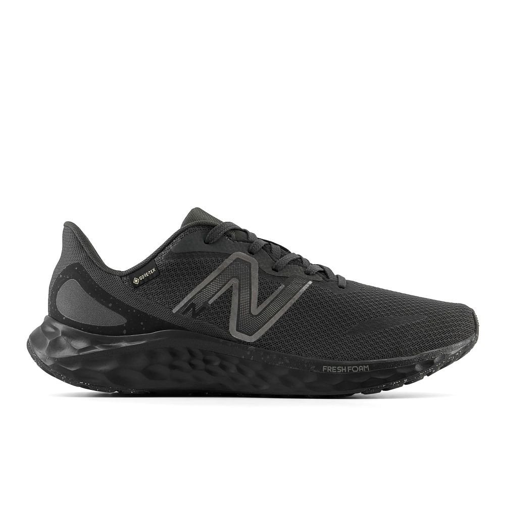 New Balance Fresh Foam Arishi V4 GTX Womens running shoes in Black/Black - side view on white background